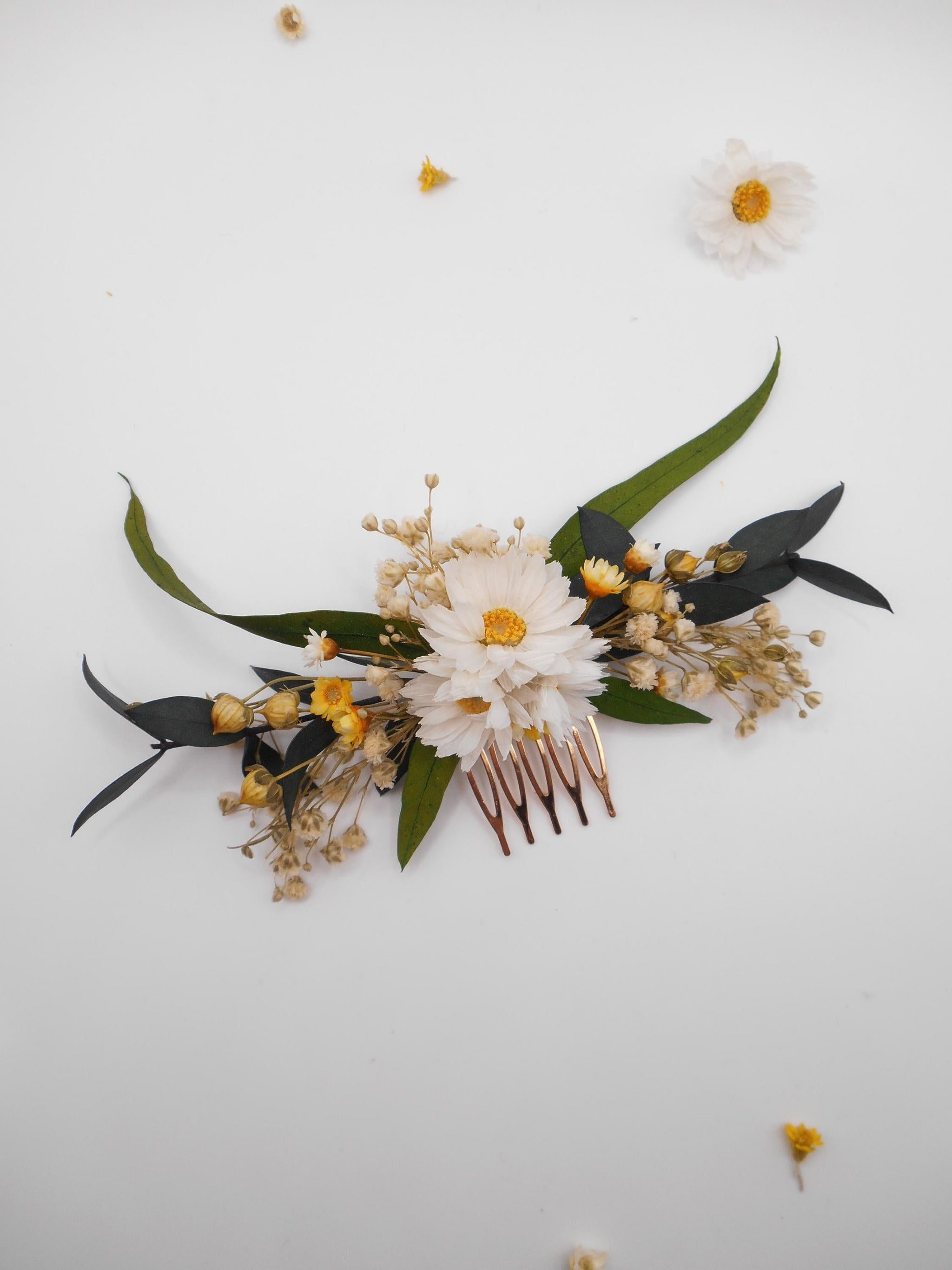 Dried flower hair comb on a golden metal  base with daisies and green eucalyptus