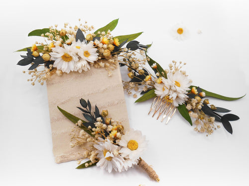 Floral hair accessories including a headband, clip, and boutonniere on a white background